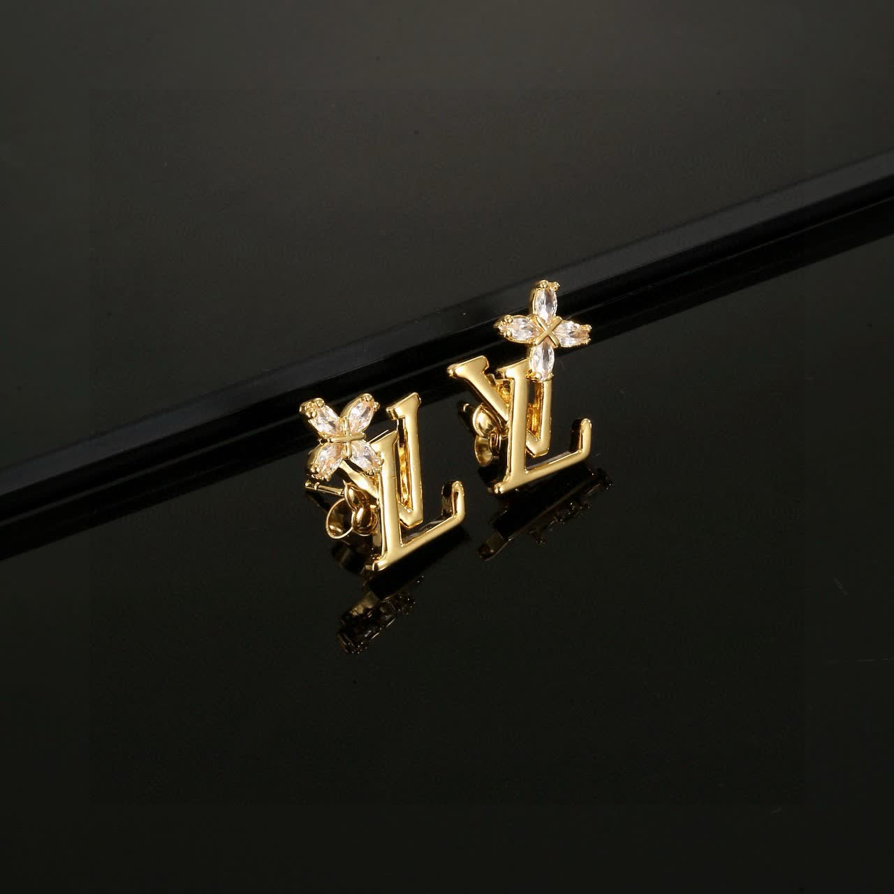 Louis Vuitton Gold Tone Crystal Flower Earrings